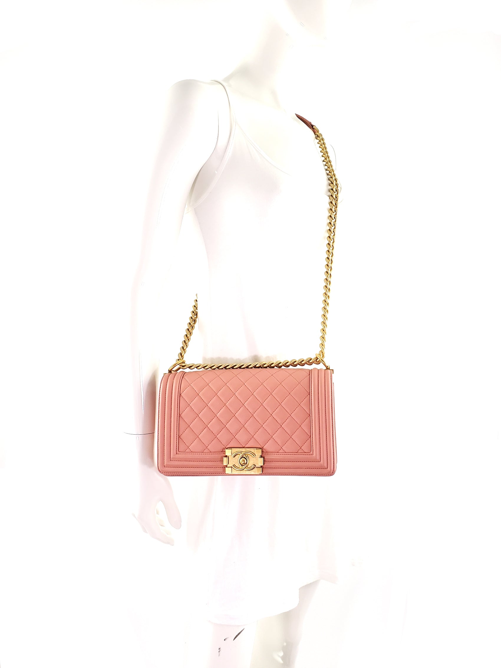 CHANEL Quilted Pink Caviar Boy Old Medium Flap Bag