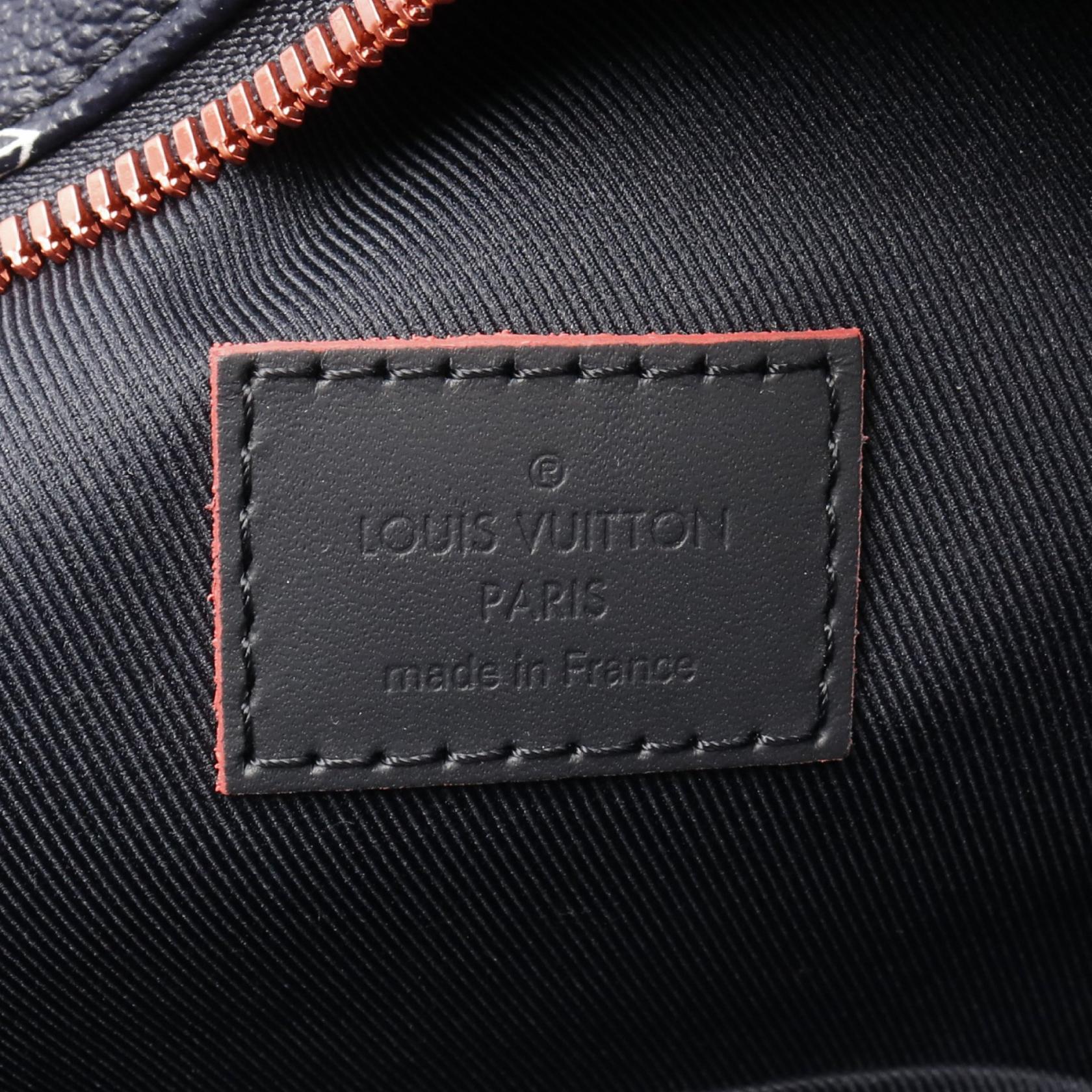 Louis Vuitton Apollo Monogram Ink Upside Down Coated Canvas Backpack