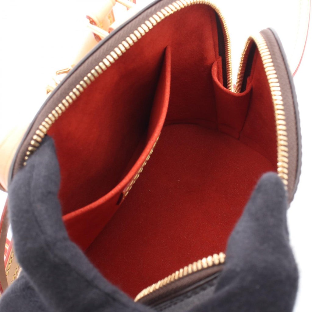 Louis Vuitton Alma Monogram Backpack