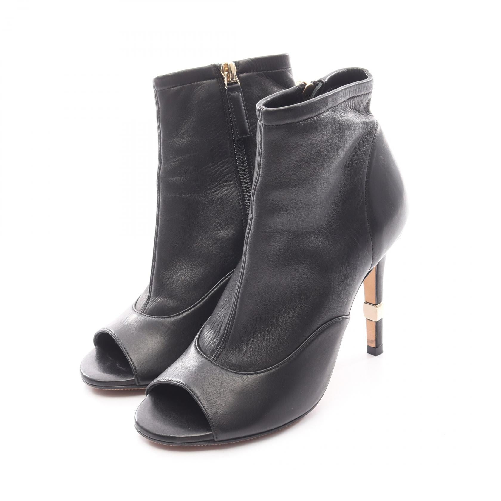 Chanel Coco Mark Leather Boots