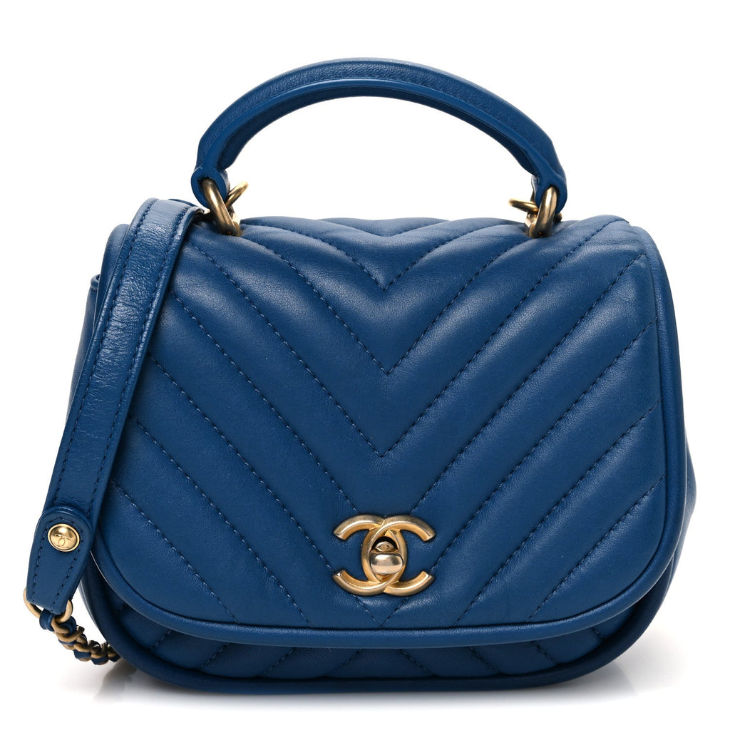 Lambskin Reverse Chevron Quilted Mini Round Top Handle Flap Blue