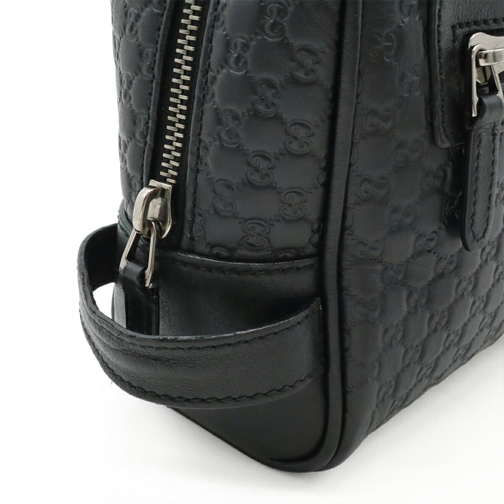 Gucci Microguccissima Leather Clutch Bag