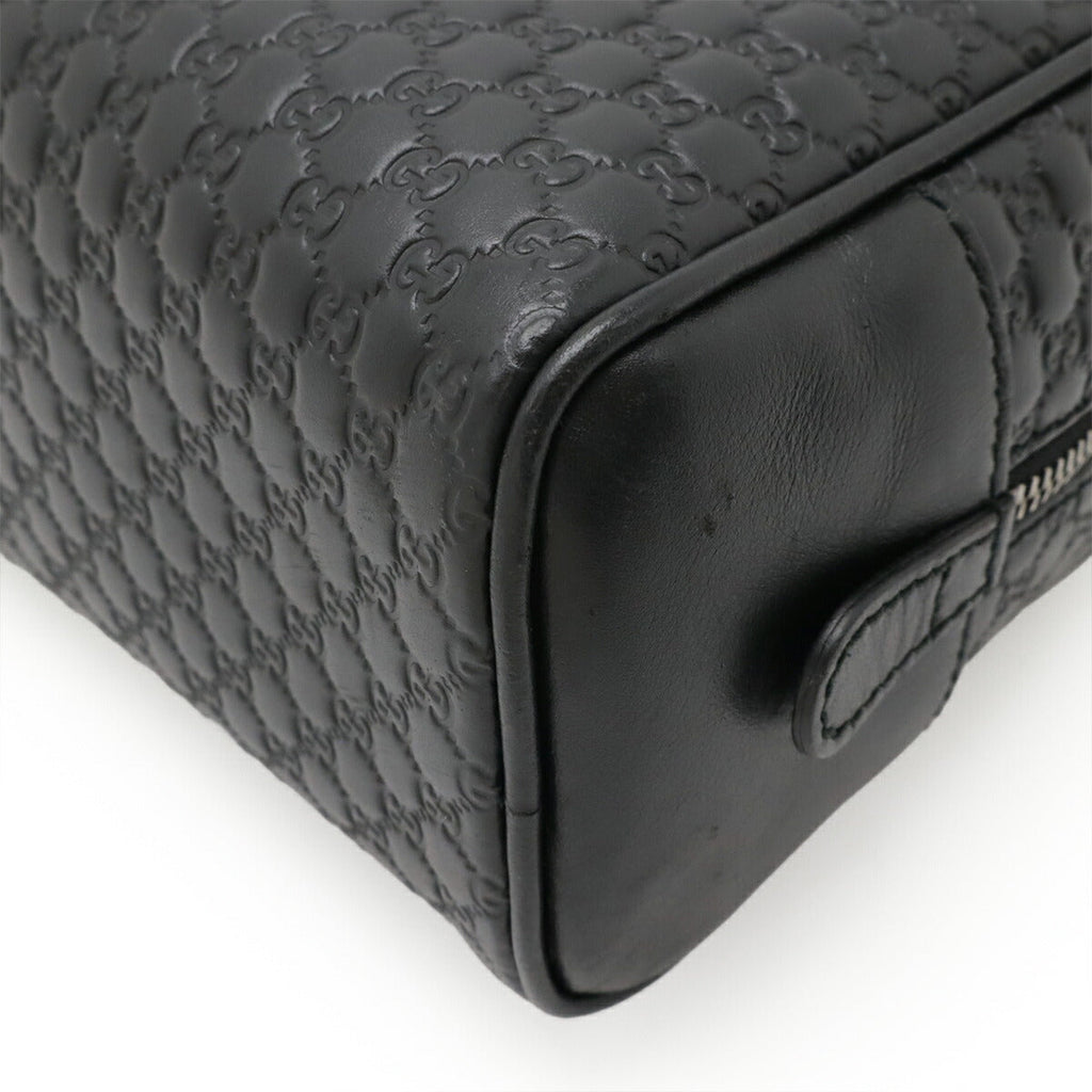 Gucci Microguccissima Leather Clutch Bag