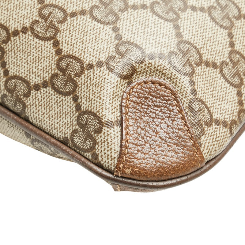 Gucci GG Supreme PVC clutch bag