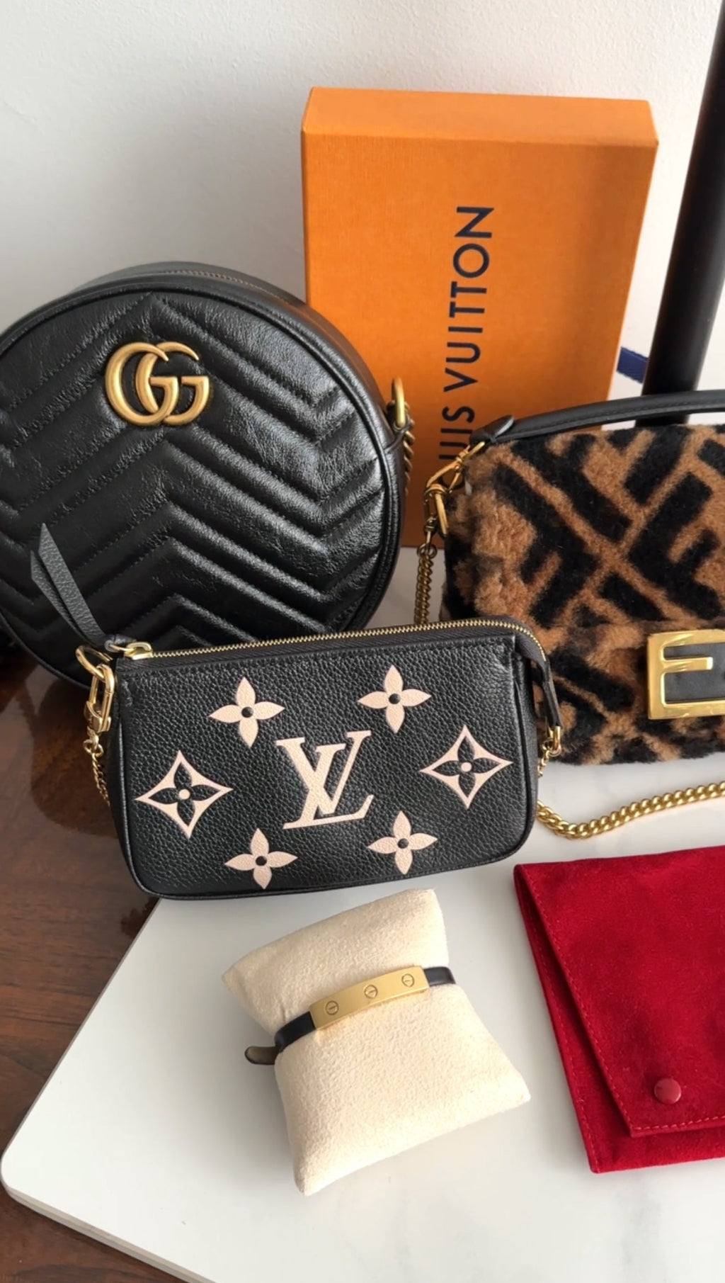 Louis Vuitton Bicolour Mini Pochette Accessoires Empreinte Monogram