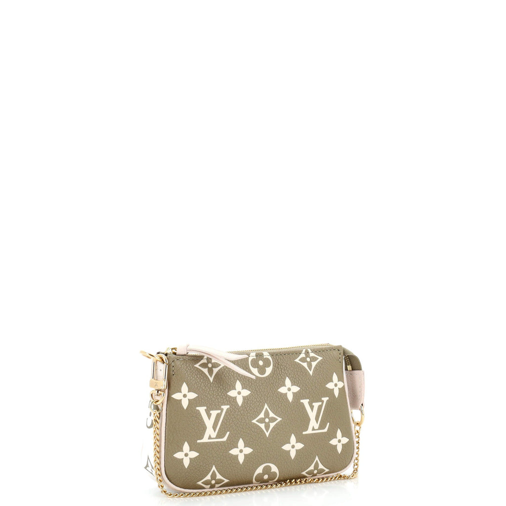 Pochette Accessoires Spring in the City Monogram Empreinte Leather Mini