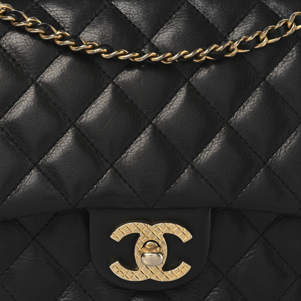 Calfskin Quilted Rock The Corner Flap Black