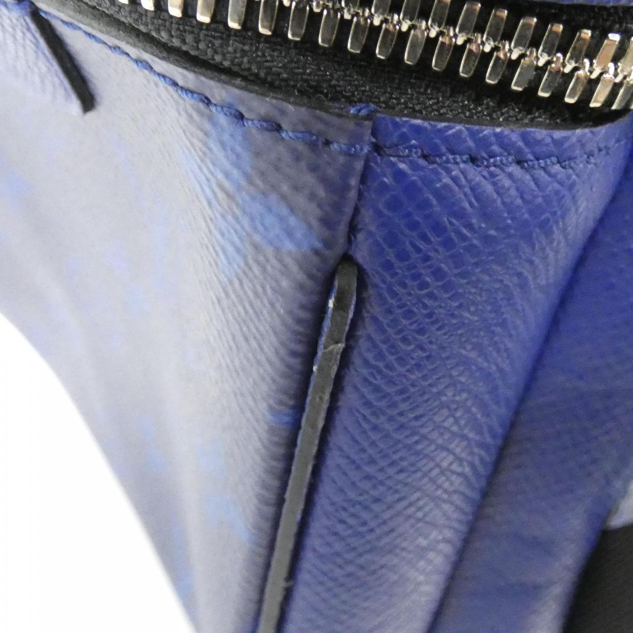 Louis Vuitton Taiga Lama Coated Canvas Calf Backpack
