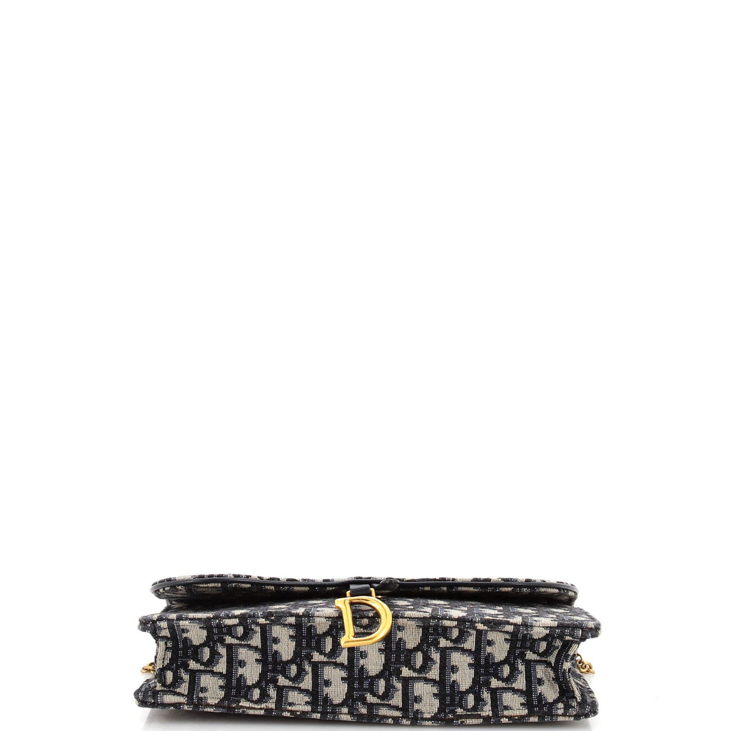Saddle Chain Clutch Oblique Canvas