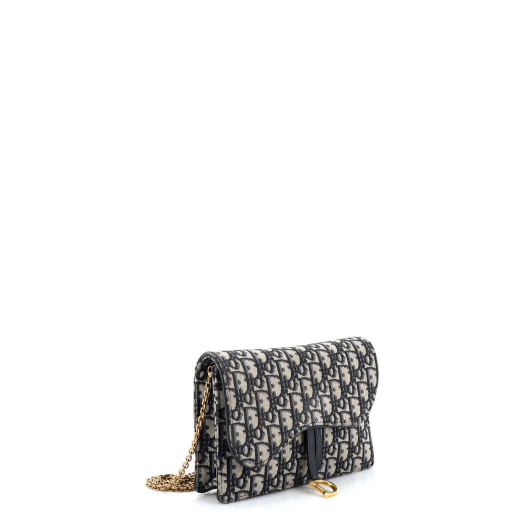 Saddle Chain Clutch Oblique Canvas