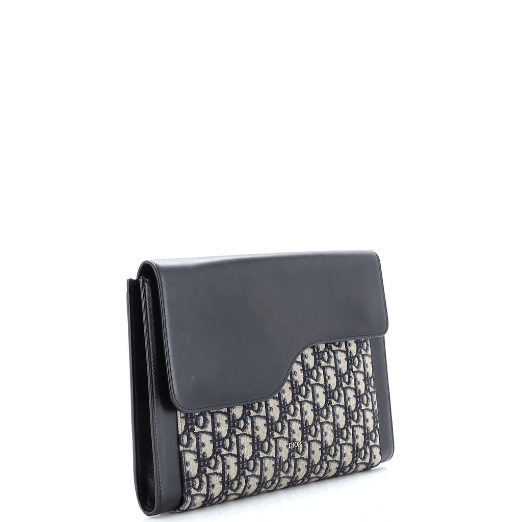 Saddle Clutch Oblique Canvas and Leather