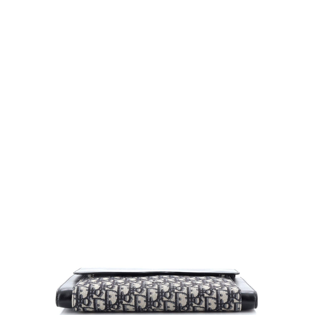 Saddle Clutch Oblique Canvas and Leather