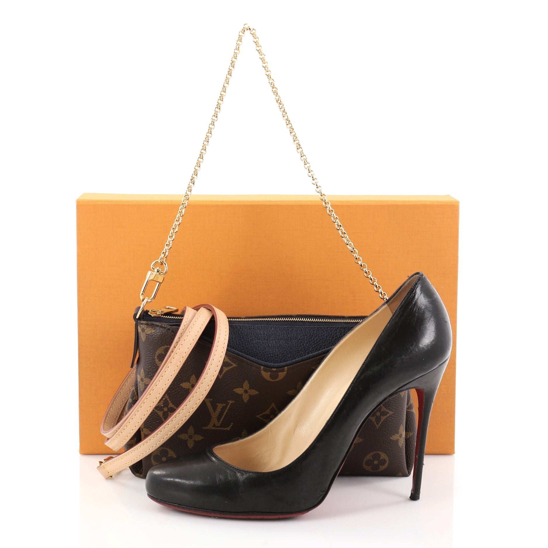 Pallas Clutch Monogram Canvas