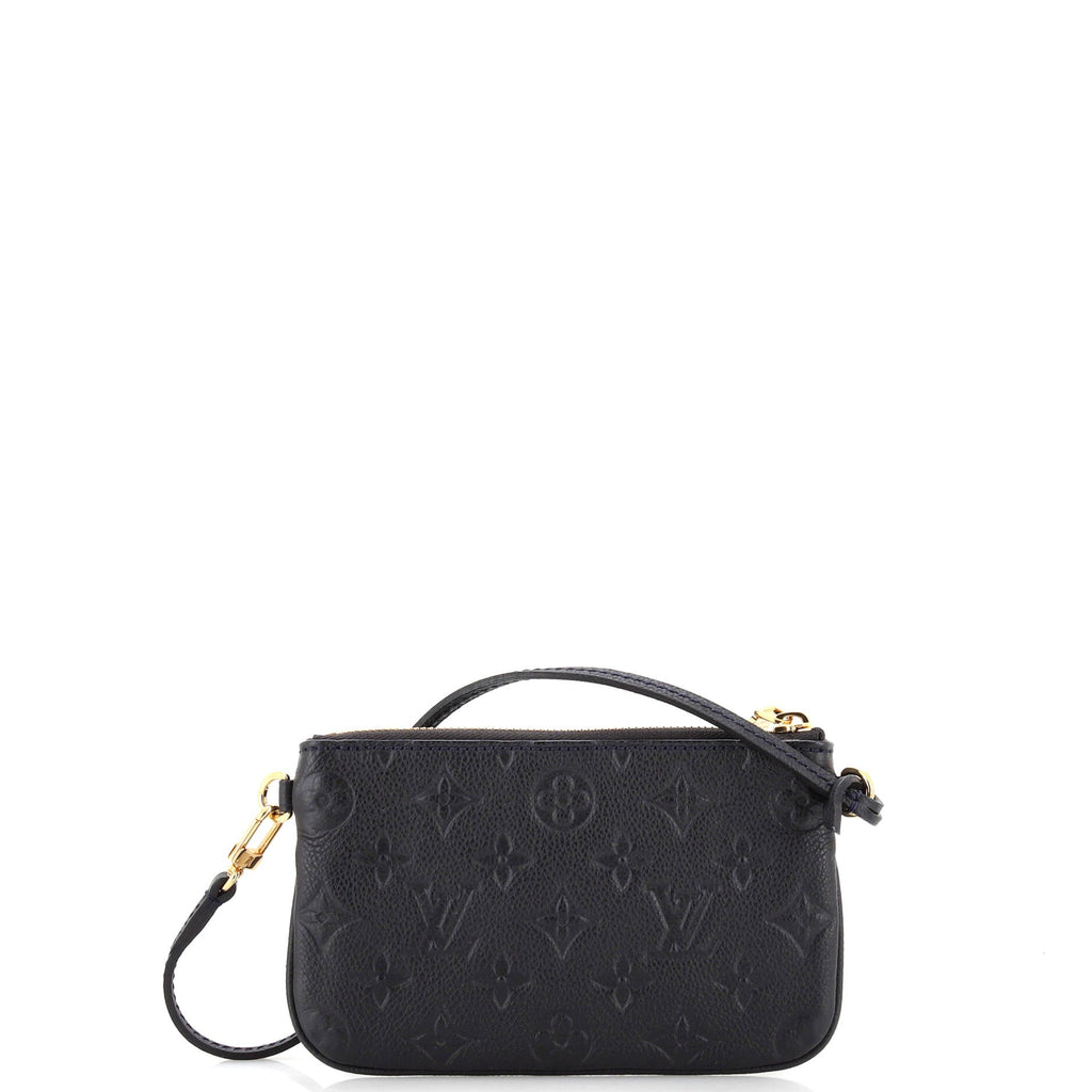 Pochette Accessoires Monogram Empreinte Leather Mini