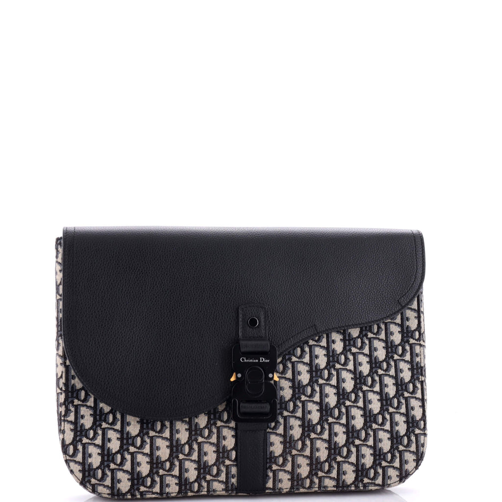 Saddle A4 Clutch Oblique Canvas and Leather