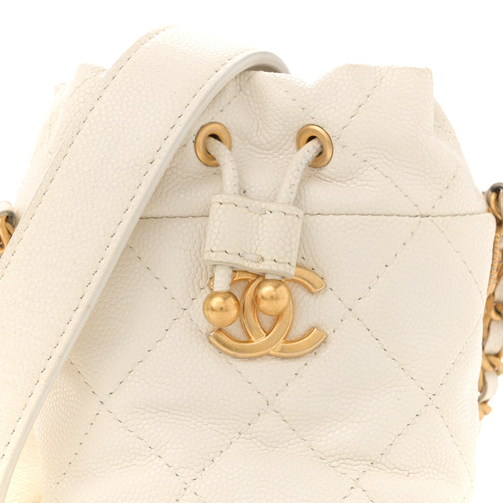 Caviar Quilted Twist Your Buttons Mini Bucket Bag White