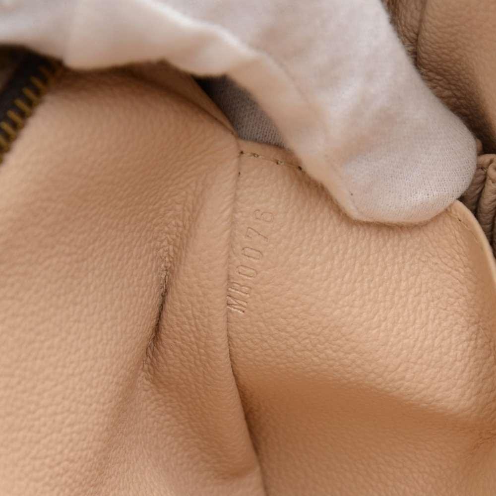 Louis Vuitto Trousse Toilette 23 Monogram Canvas Clutch Bag