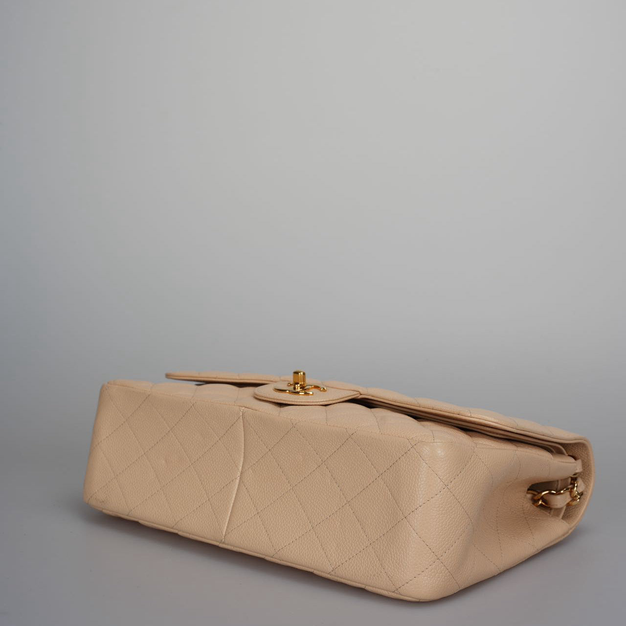 Chanel Classic Double Flap Bag Jumbo in Beige Quilted Caviar Leather with Gold Hardware