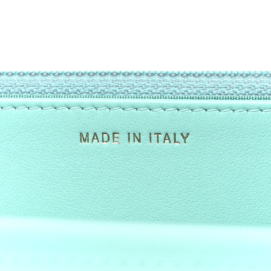 Caviar Quilted Boy Wallet On Chain WOC Light Blue