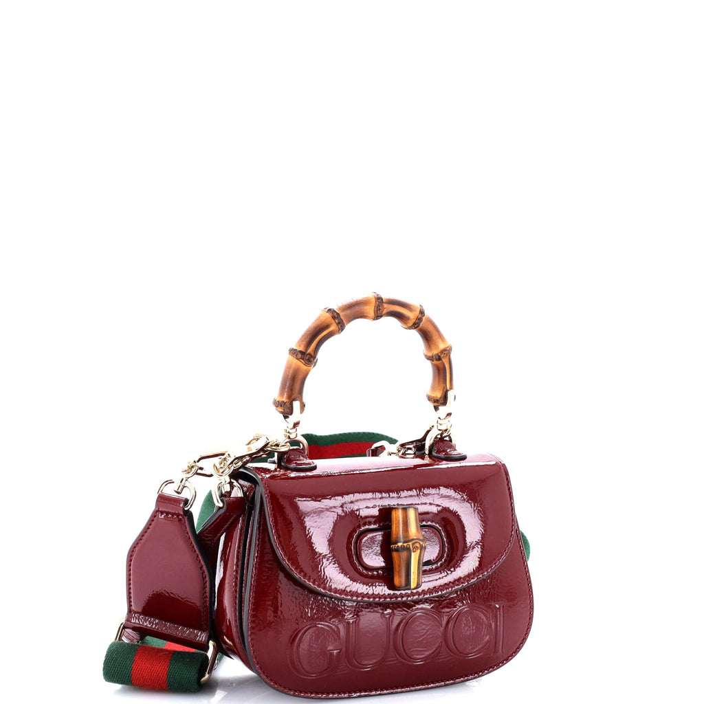 Bamboo 1947 Logo Top Handle Bag Embossed Patent Mini