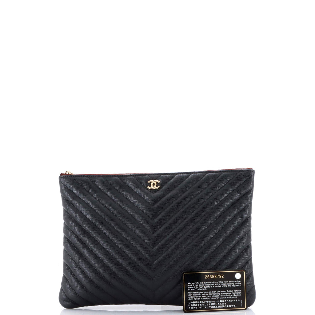 O Case Clutch Chevron Caviar Medium