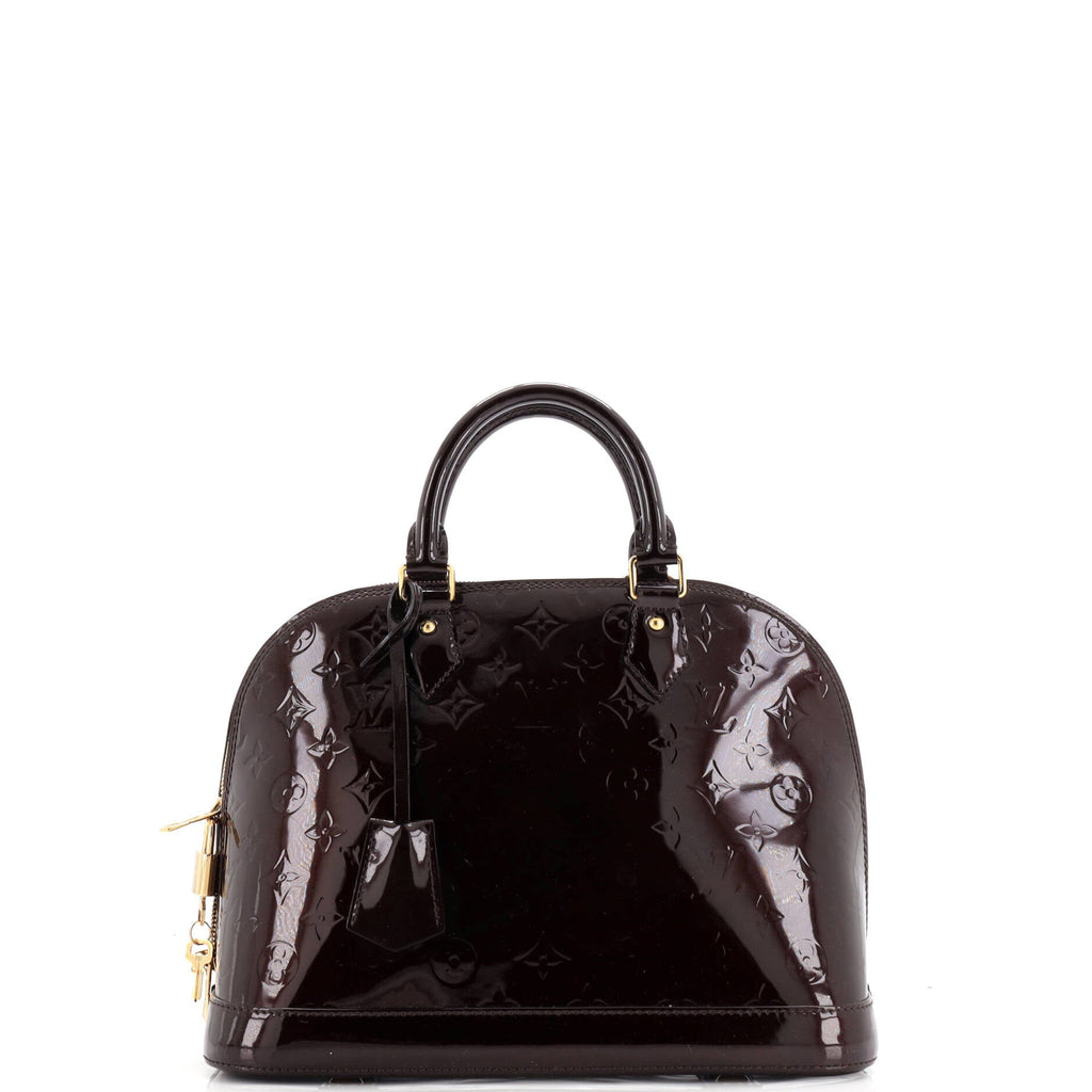 Alma Handbag Monogram Vernis PM