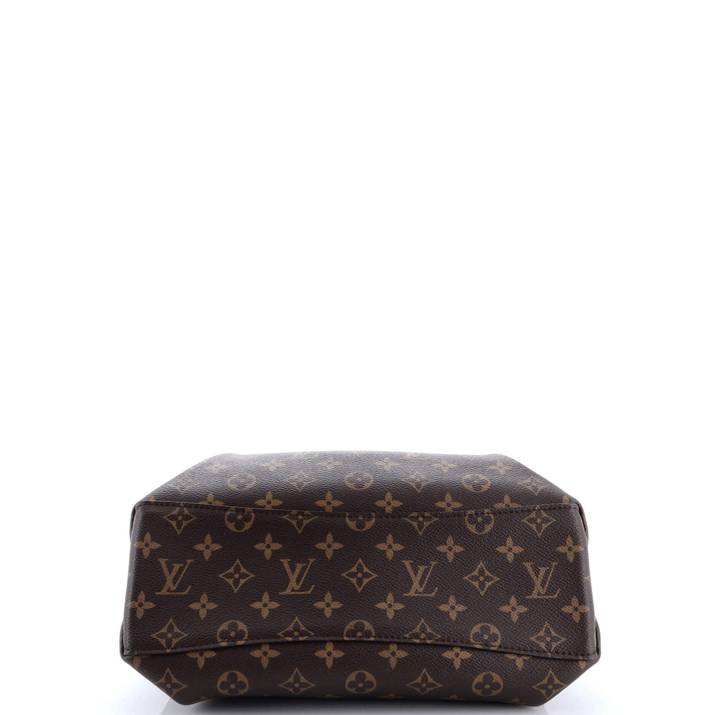 Rivoli Handbag Monogram Canvas MM
