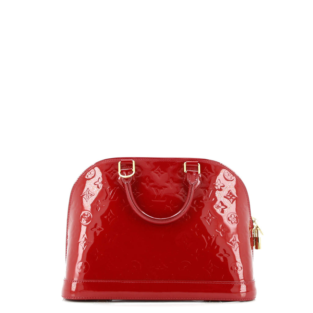 Alma Handbag Monogram Vernis PM