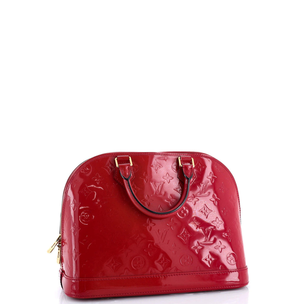 Alma Handbag Monogram Vernis PM