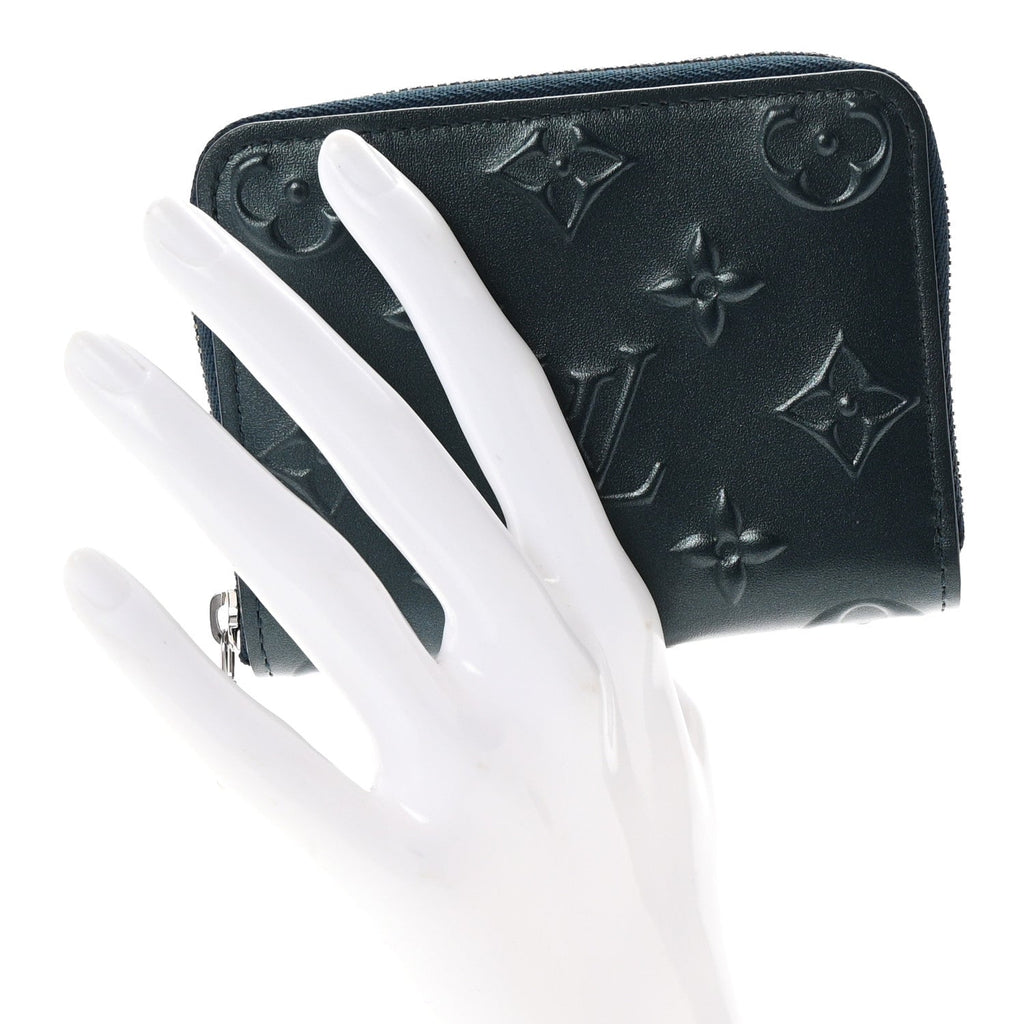 Calfskin Debossed Monogram Zippy Coin Purse Blue