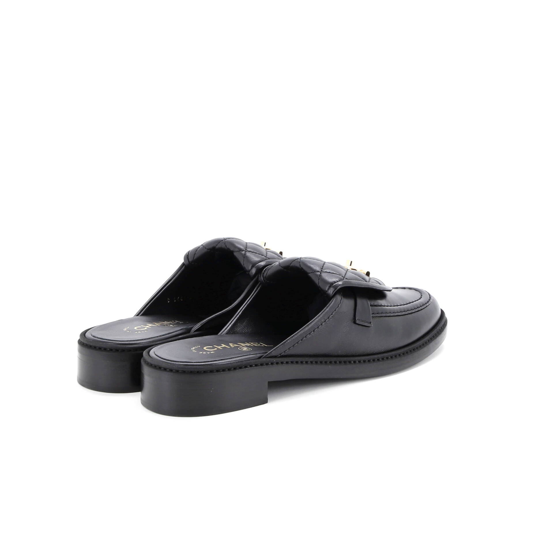Women's CC Turnlock Flat Mules Quilted Leather
