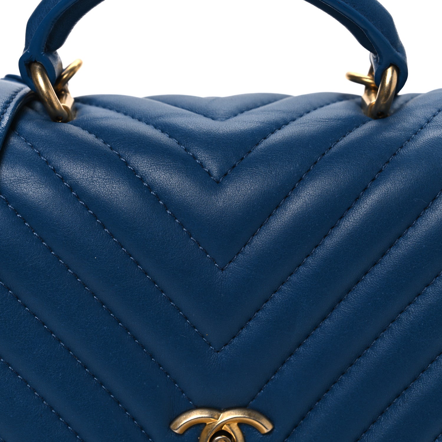 Lambskin Reverse Chevron Quilted Mini Round Top Handle Flap Blue