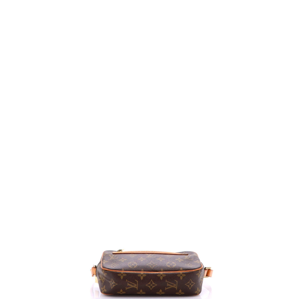 Cite Pochette Monogram Canvas