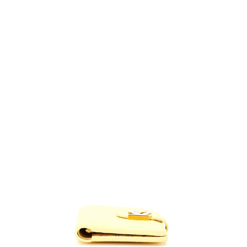 LV Vertical Wallet Taurillion Leather Compact