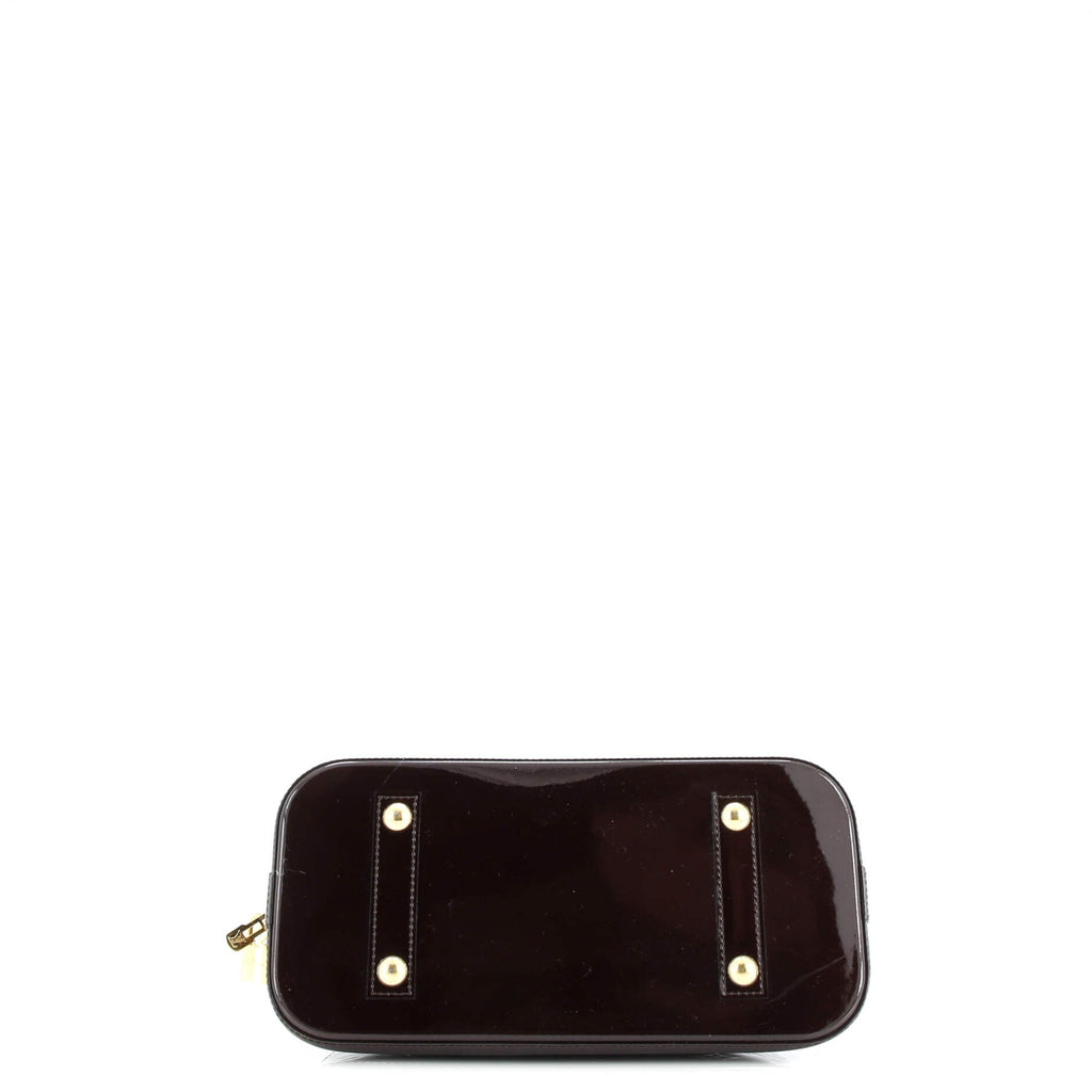 Alma Handbag Monogram Vernis PM