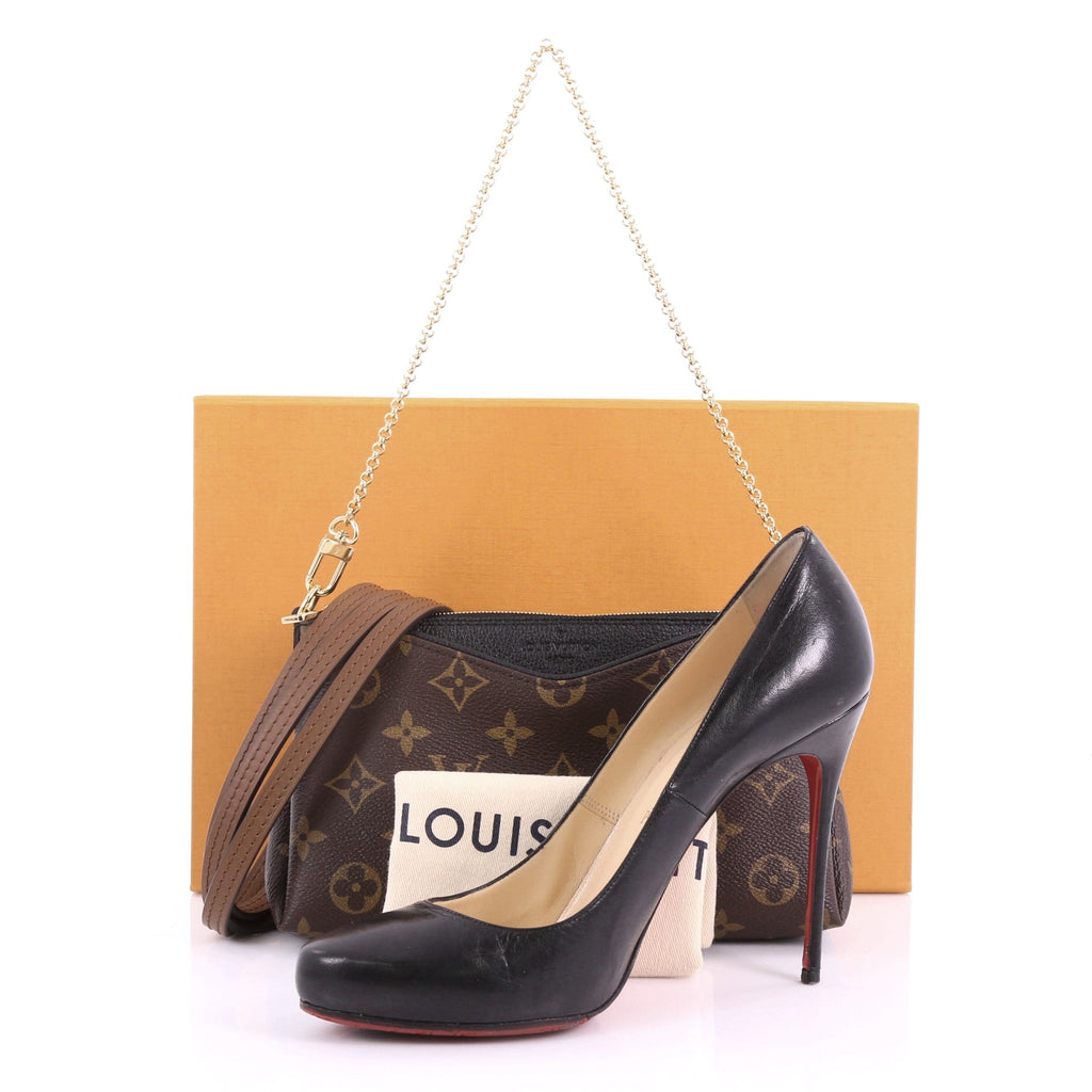 Pallas Clutch Monogram Canvas