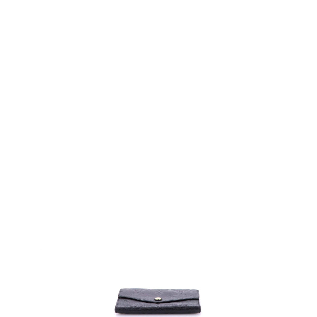 Curieuse Wallet Monogram Empreinte Leather Compact