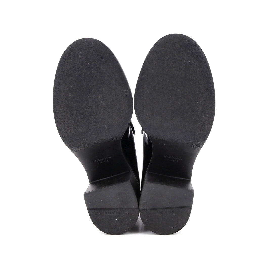 Women's Triangle Logo Heeled Loafers Spazzolato Leather