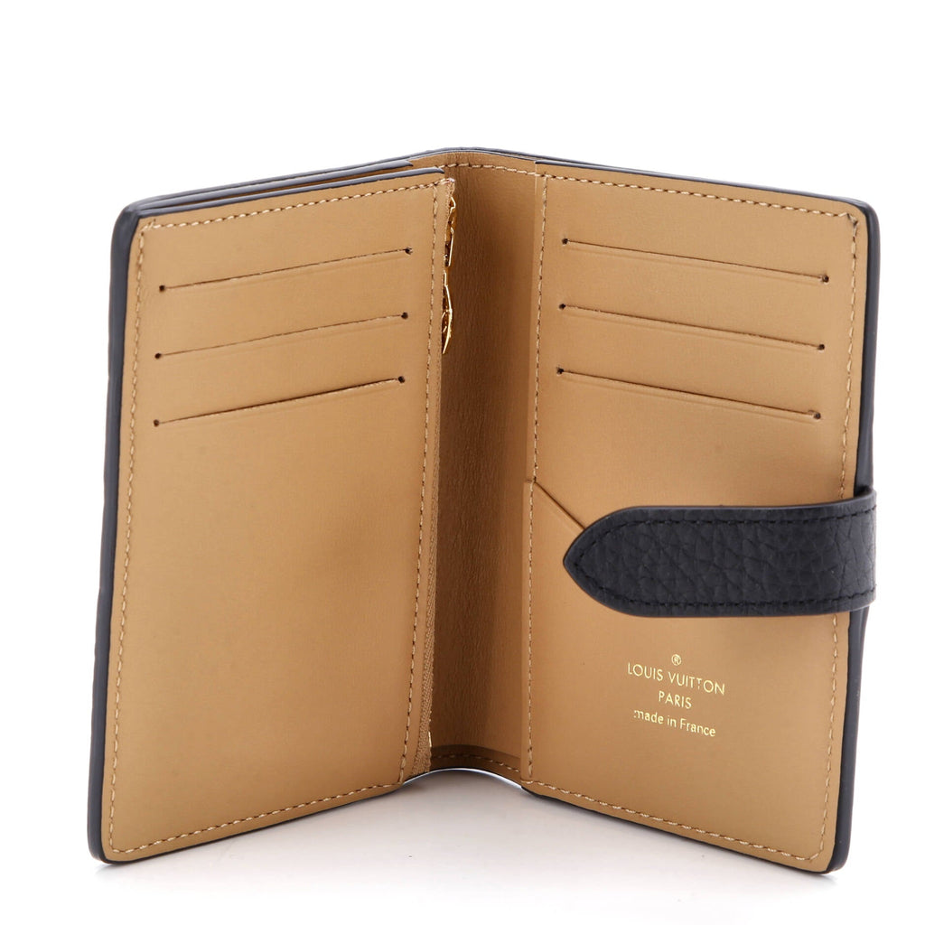 LV Vertical Wallet Taurillion Leather Compact