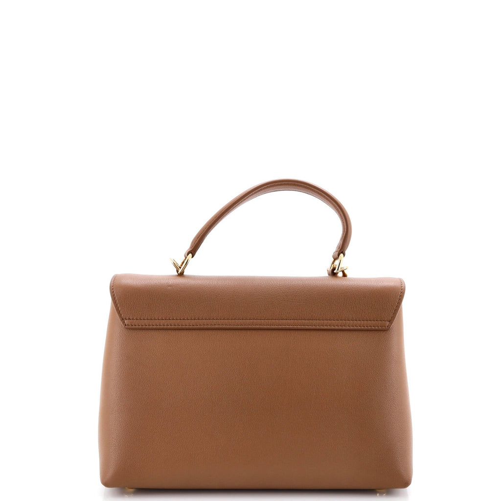 Nino Top Handle Bag Leather Medium