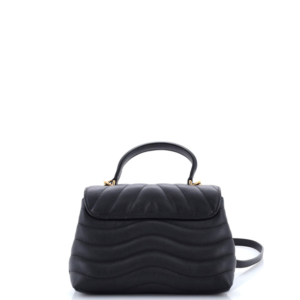 New Wave Hold Me Top Handle Bag Quilted Leather