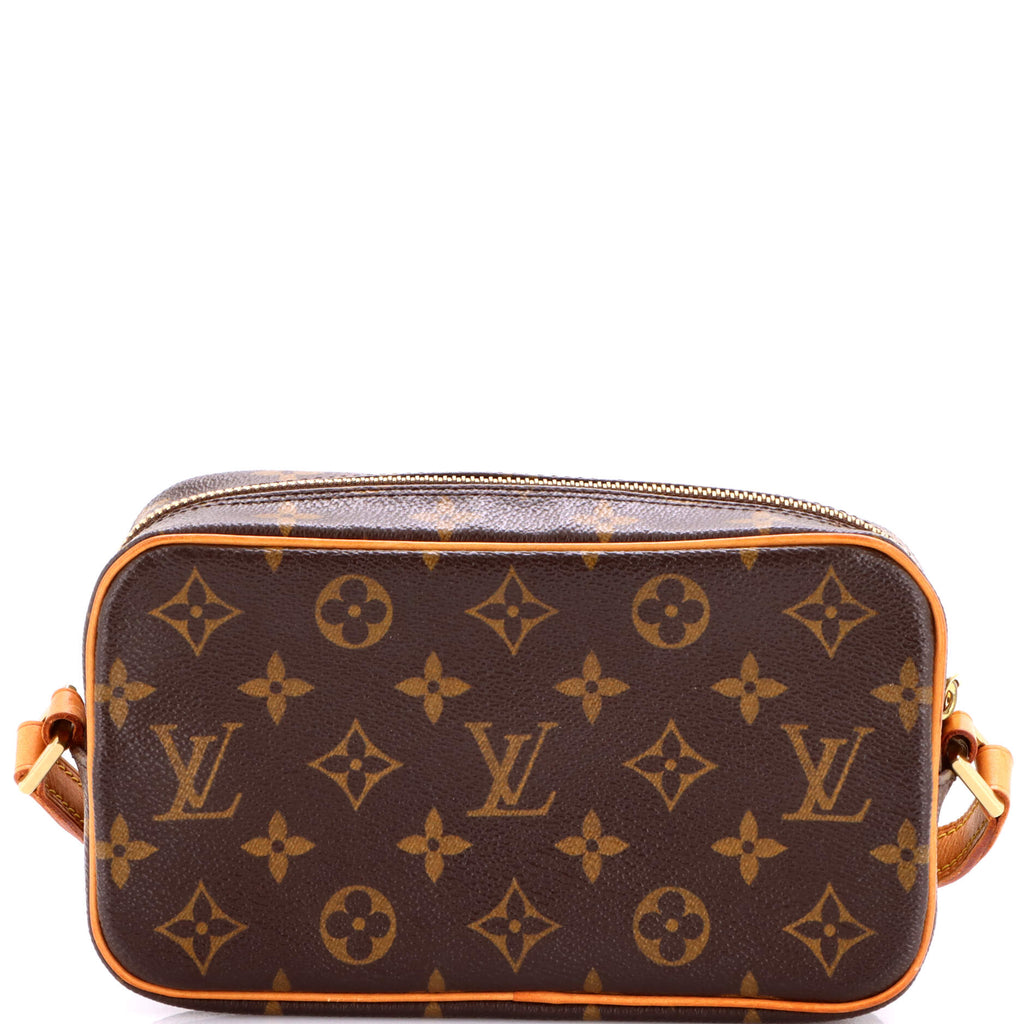 Cite Pochette Monogram Canvas