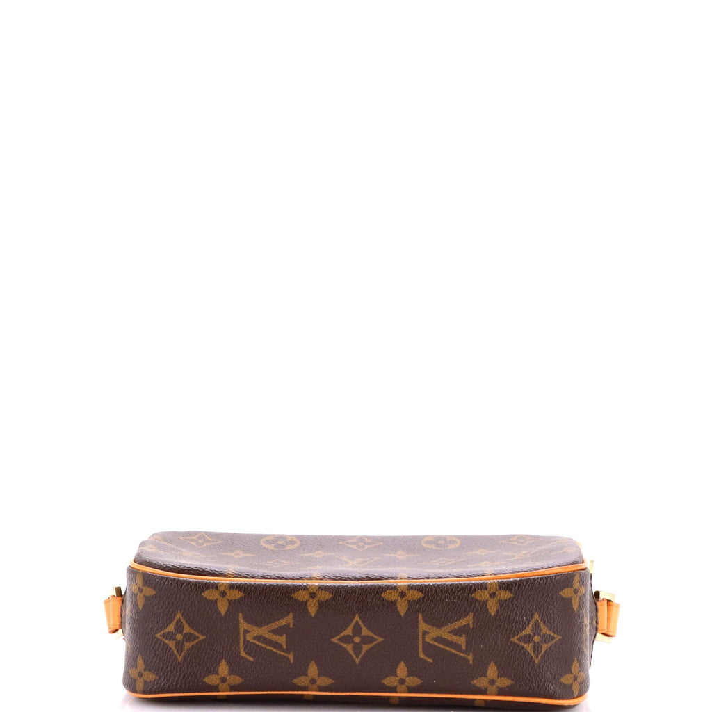 Cite Pochette Monogram Canvas