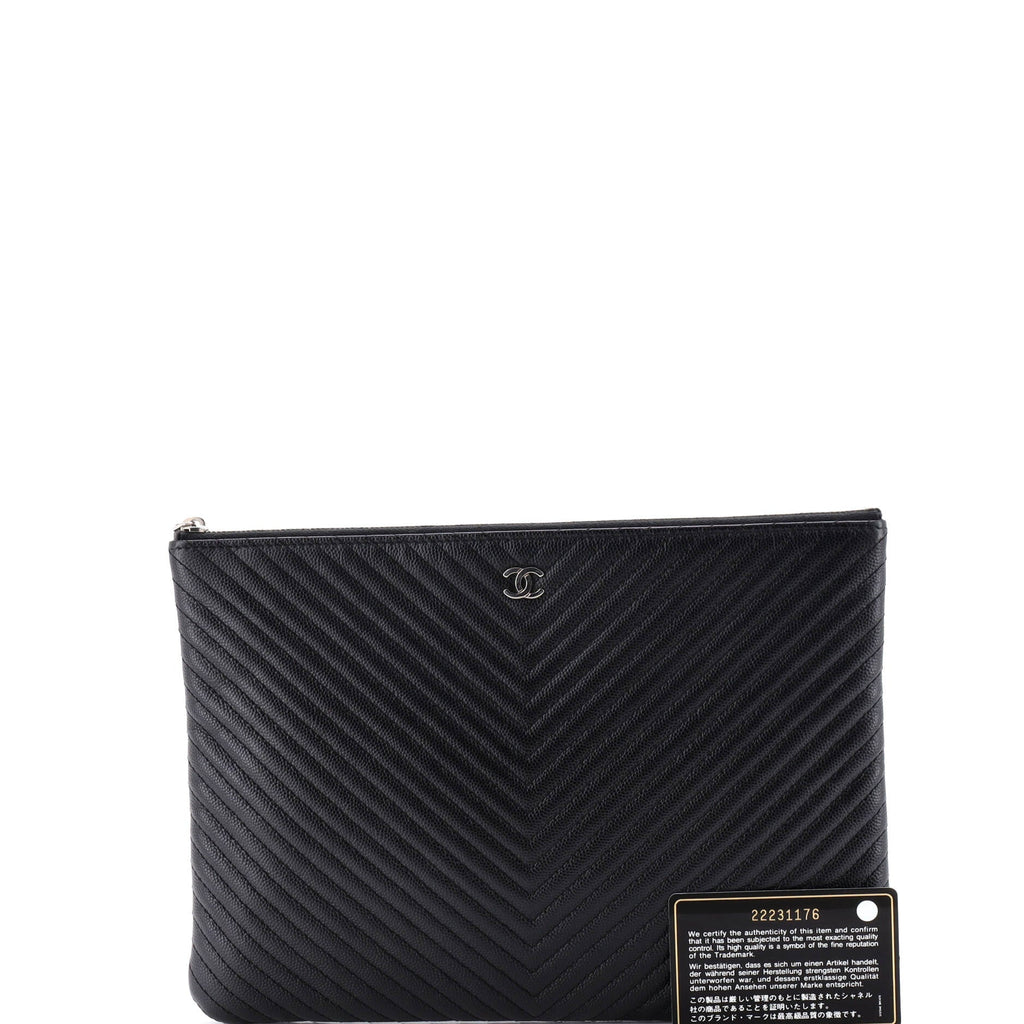 O Case Clutch Chevron Caviar Medium