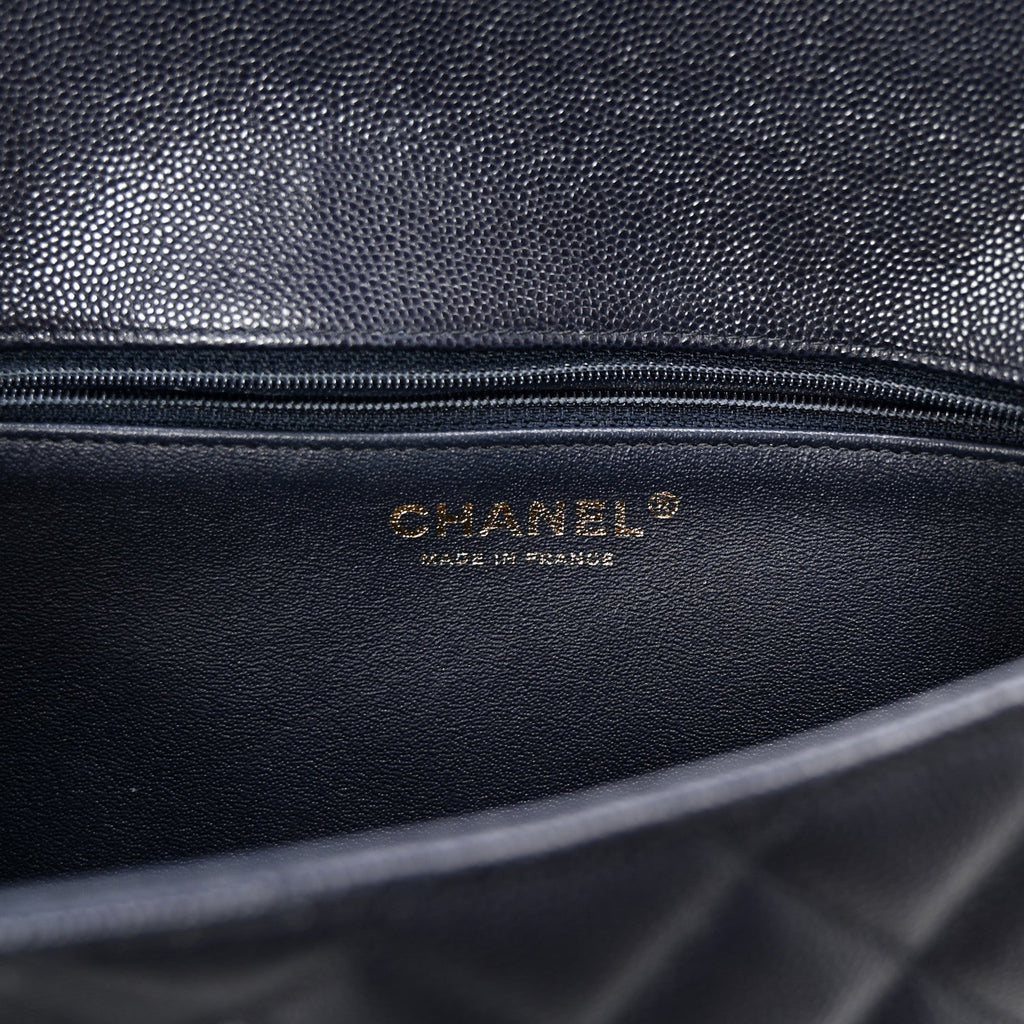 Caviar Quilted Flap Clutch Navy