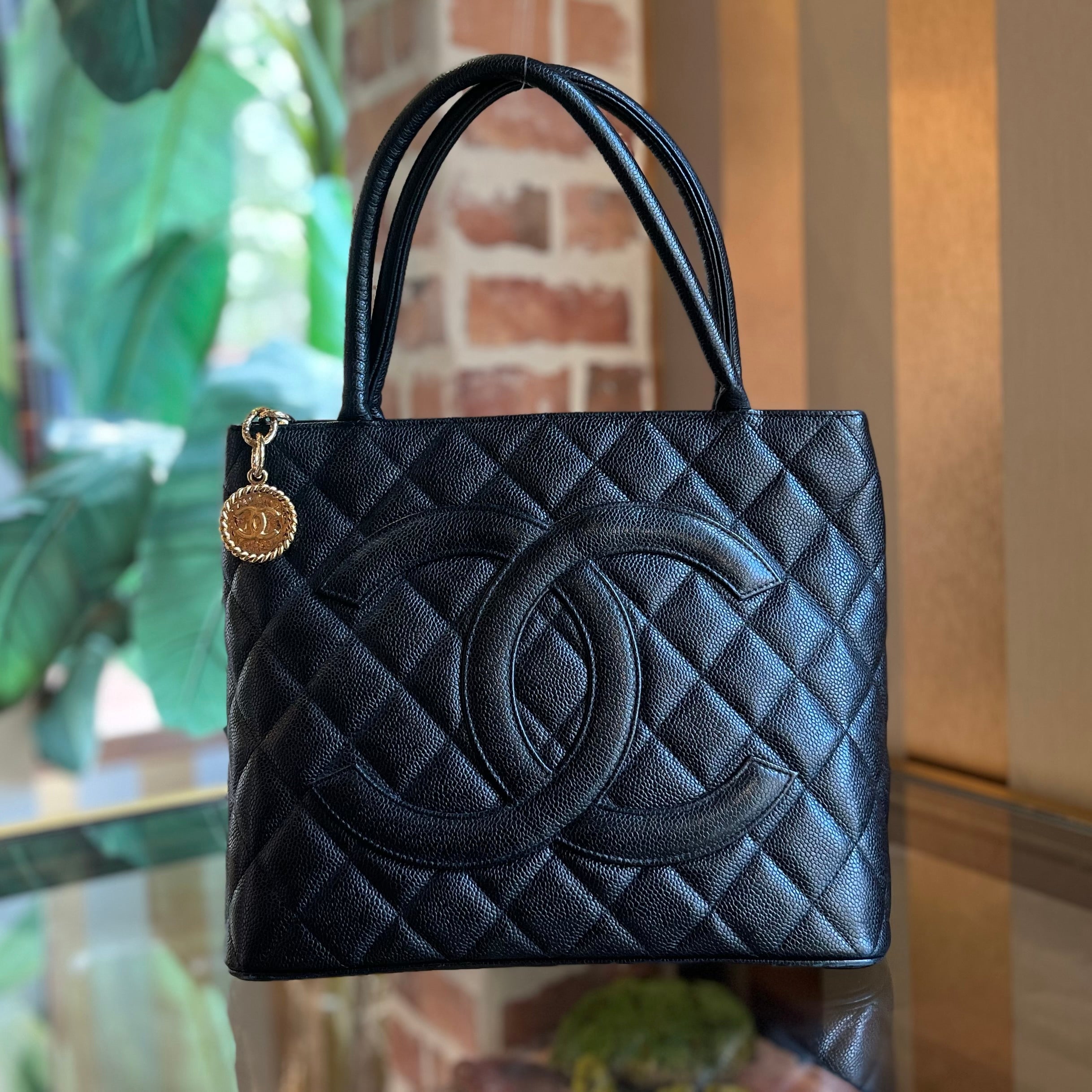 CHANEL Medallion Quilted Caviar Leather Tote Bag