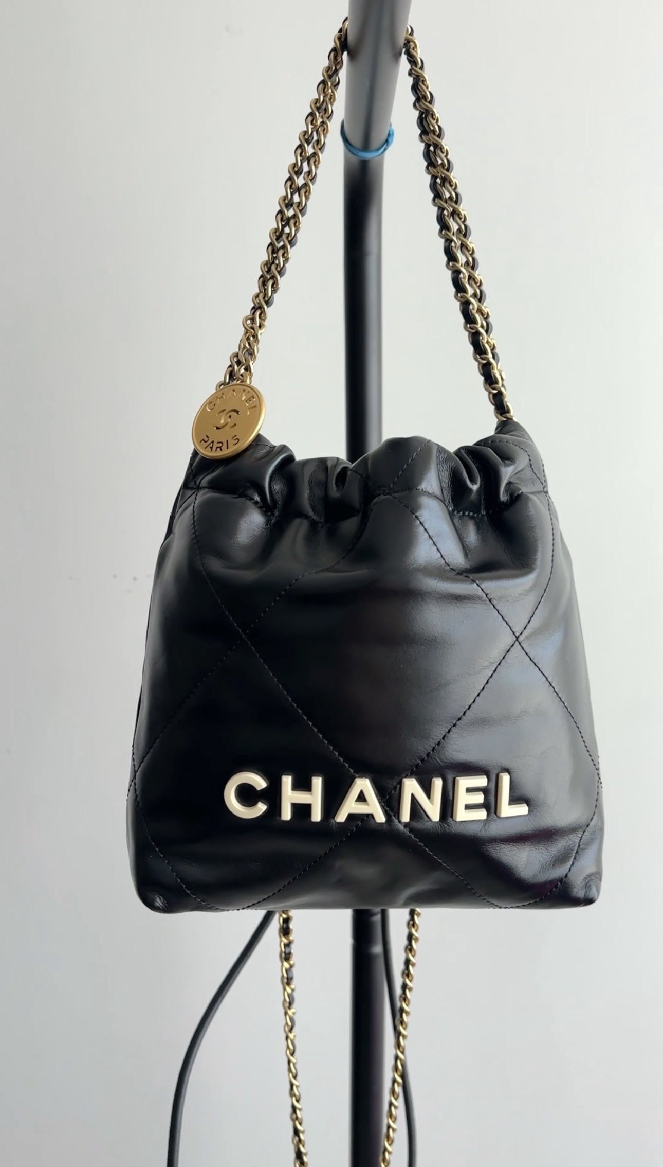 Chanel 2023 Black Leather Chain 22 Mini Bag with Ivory Enamel Logo