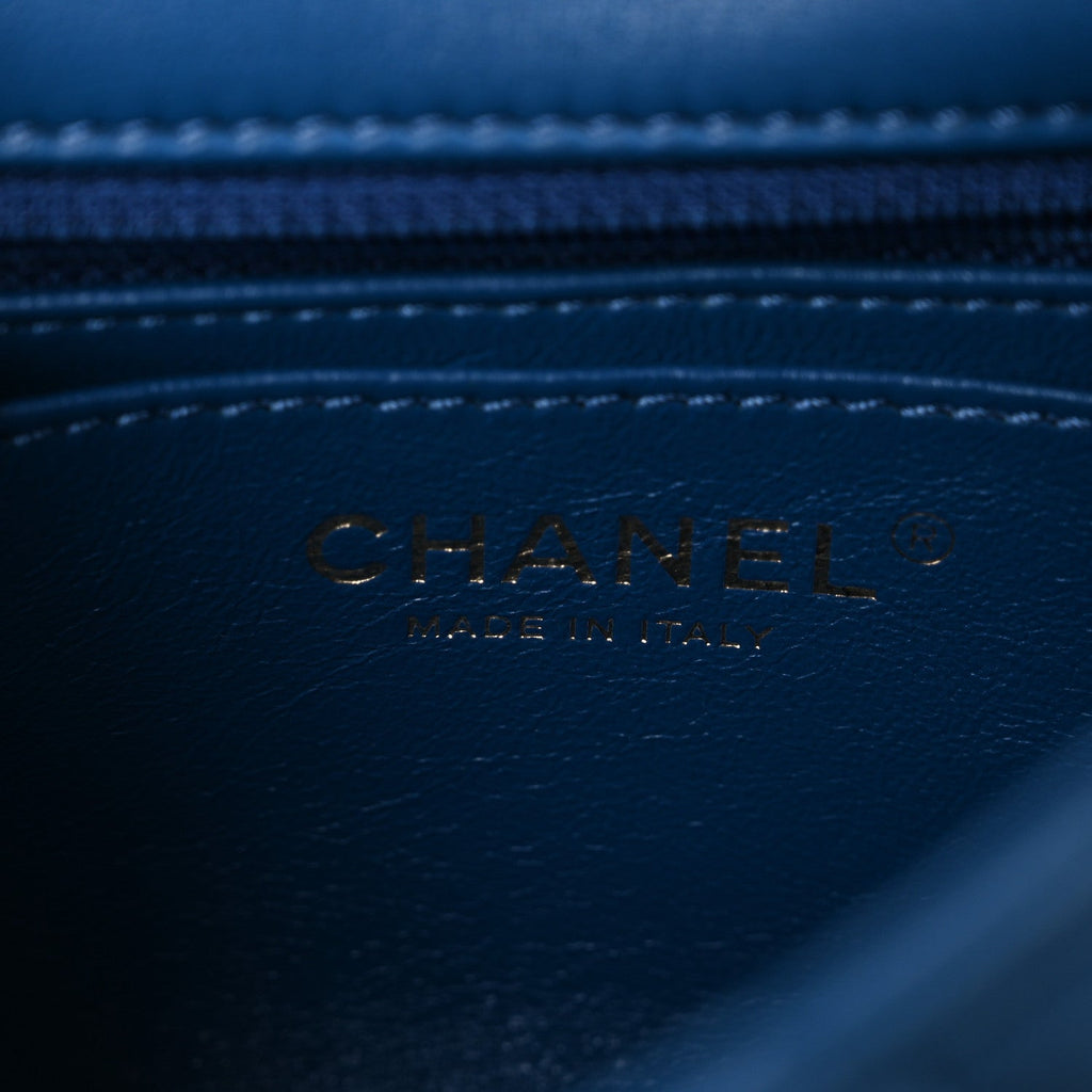 Lambskin Reverse Chevron Quilted Mini Round Top Handle Flap Blue