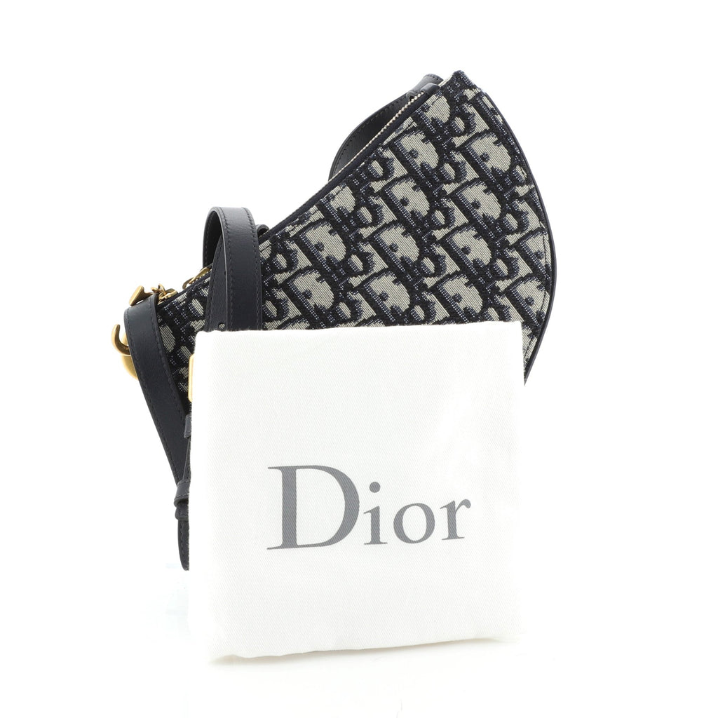Saddle Triple Zip Crossbody Clutch Oblique Canvas