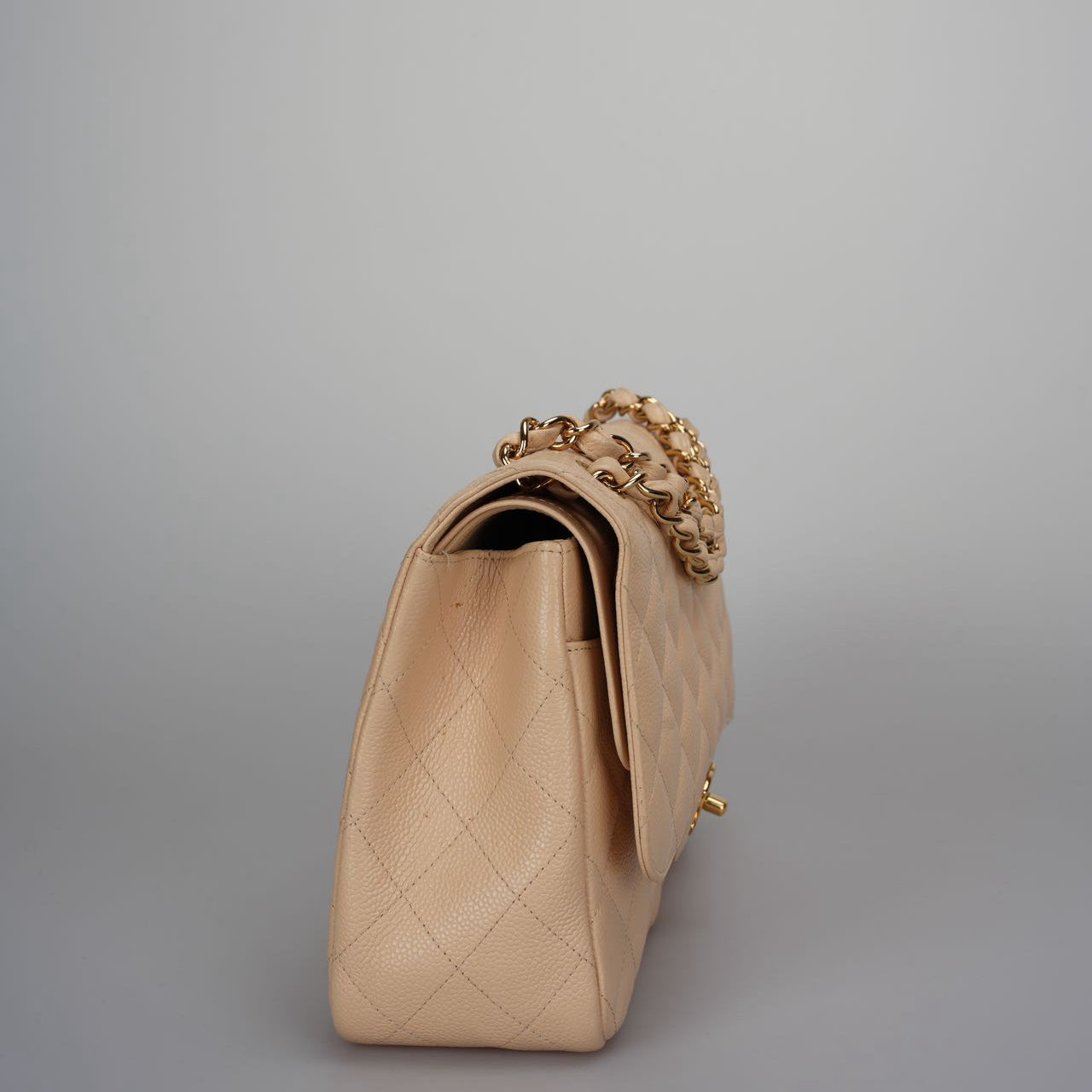 Chanel Classic Double Flap Bag Jumbo in Beige Quilted Caviar Leather with Gold Hardware